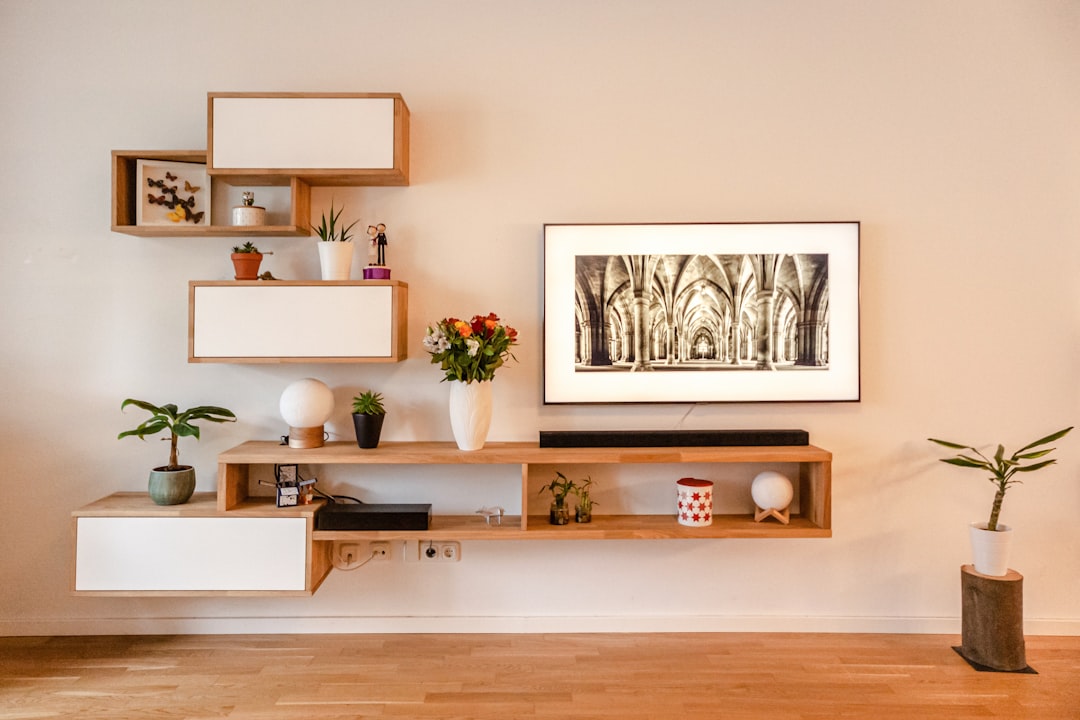 individual sideboard made of solid oak and MDF, fixed to the wall.